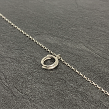 Load image into Gallery viewer, Twined silver circle pendant
