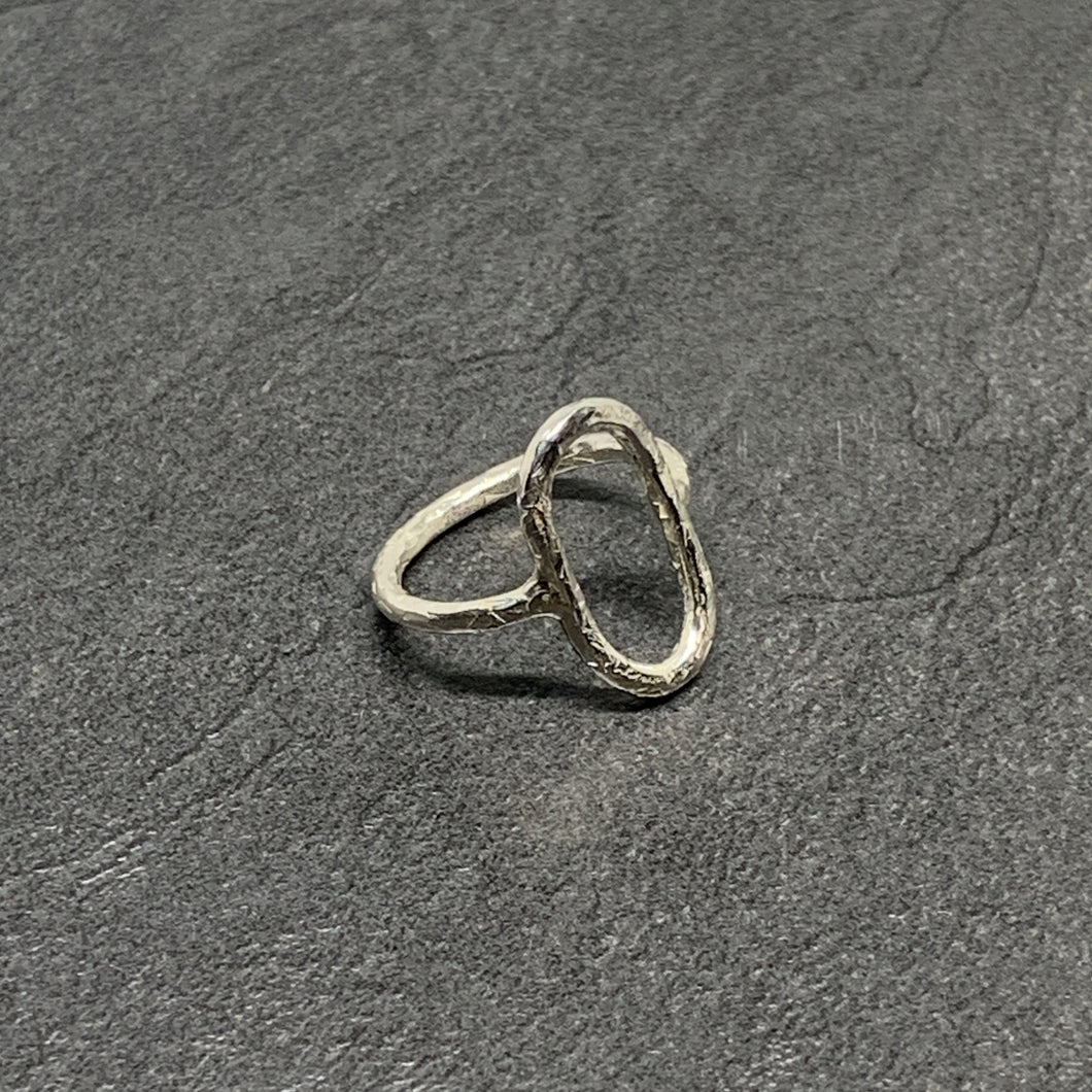 Hammered silver open oval ring