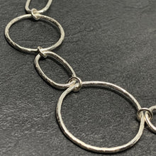 Load image into Gallery viewer, Hammered silver open circle and oval necklace
