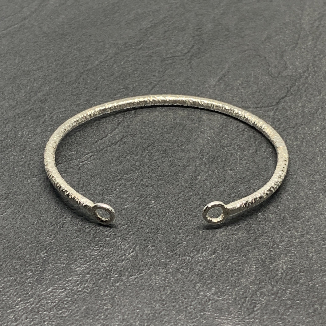 Hammered silver open circle cuff