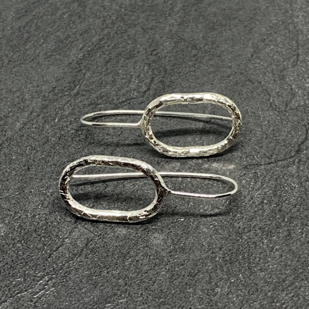 Hammered silver open oval drops