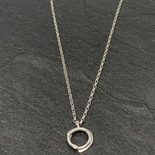 Load image into Gallery viewer, Twined silver circle pendant
