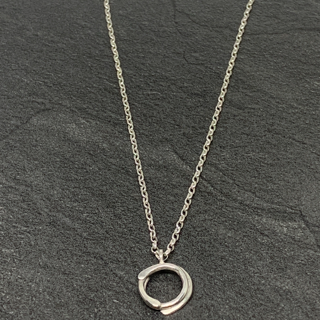 Twined silver circle pendant